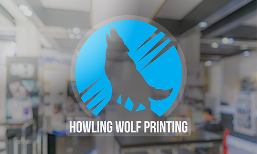 Custom Clear Sticker of a wolf howling against a blue background with text that says Howling Wolf Printing.